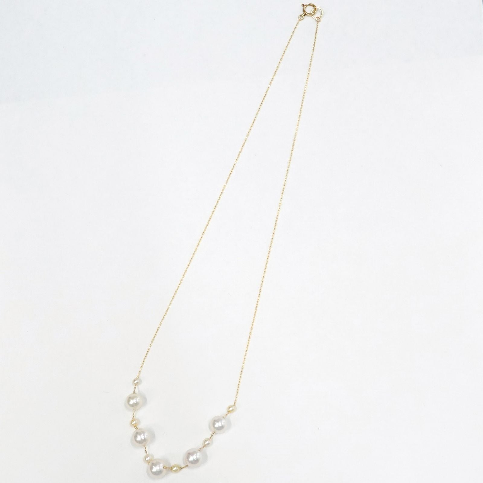 Perlagione Akoya pearl necklace with 7mm pearls and 3mm baby pearls on 44cm K14 yellow gold chain