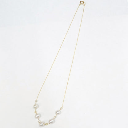 Perlagione Akoya pearl necklace with 7mm pearls and 3mm baby pearls on 44cm K14 yellow gold chain