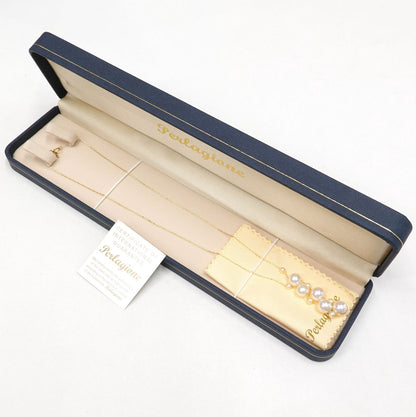 Perlagione Akoya pearl necklace with 7mm pearls and 3mm baby pearls on 44cm K14 yellow gold chain