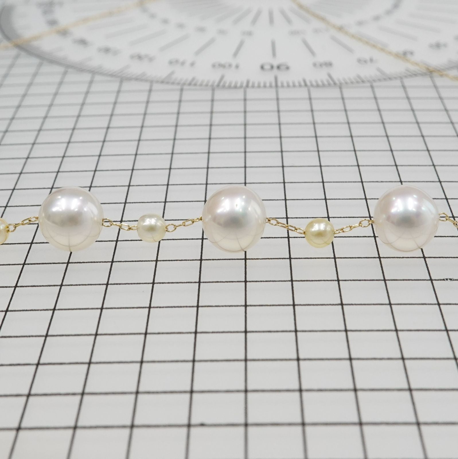 Perlagione Akoya pearl necklace with 7mm pearls and 3mm baby pearls on 44cm K14 yellow gold chain