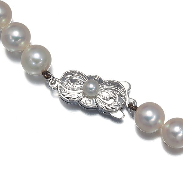 Mikimoto silver necklace featuring 7.0-7.4mm pearls, approximately 35cm long, weighing 26.7g