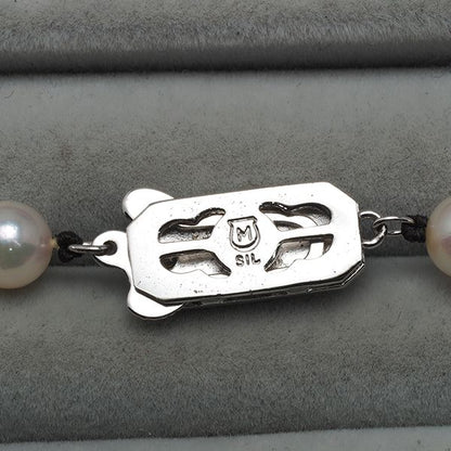 Mikimoto silver necklace featuring 6.0-6.4mm pearls measuring about 42 cm in length