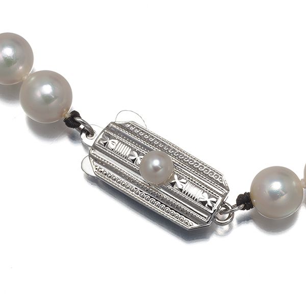 Mikimoto silver necklace featuring 6.0-6.4mm pearls measuring about 42 cm in length