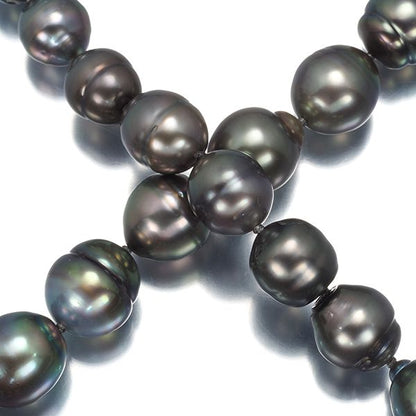 Tasaki silver necklace featuring a black cultured baroque pearl pendant, 47cm length, weighing 60.9g