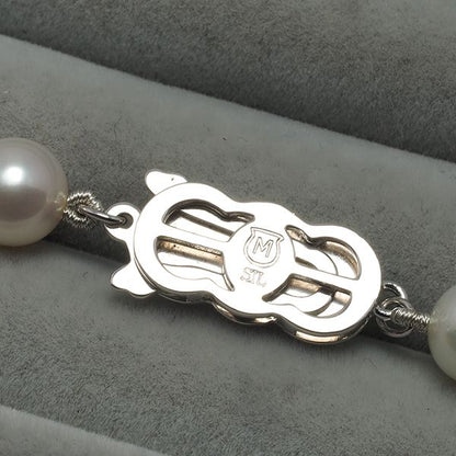 Mikimoto silver necklace featuring 7.0-7.5mm pearls with a 42cm chain length