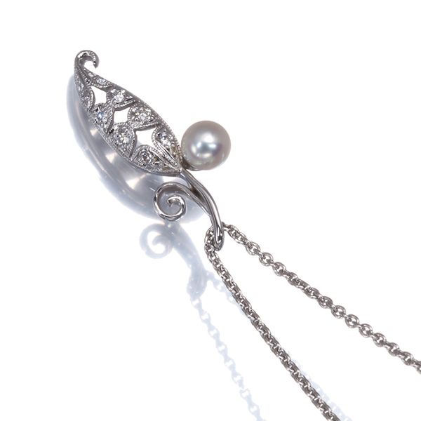 Mikimoto necklace featuring 4.5mm baby Akoya pearl and diamond leaf design in 18K white gold, 39cm length