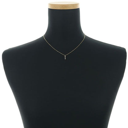 Tasaki 18K yellow gold necklace with three 0.05ct diamonds, 36 to 40 cm length, delicate 10x3.2 mm design