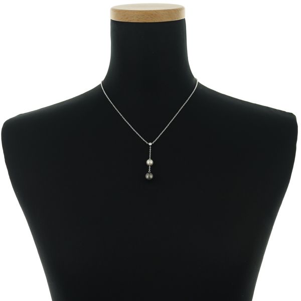 Mikimoto necklace with 9.4mm black pearl, 7.3mm Akoya pearl, diamonds, and white gold chain