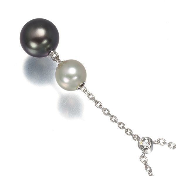 Mikimoto necklace with 9.4mm black pearl, 7.3mm Akoya pearl, diamonds, and white gold chain