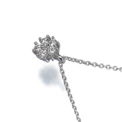 Tasaki necklace featuring 0.08ct diamond flower pendant in 18k white gold on adjustable chain