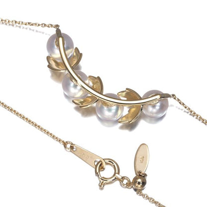 Mikimoto necklace featuring 5.8mm Akoya pearls with a leaf-shaped K18 yellow gold pendant, 48cm length