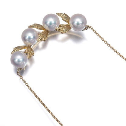 Mikimoto necklace featuring 5.8mm Akoya pearls with a leaf-shaped K18 yellow gold pendant, 48cm length