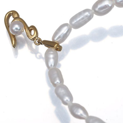 Mikimoto baby pearl necklace featuring 3.0-4.0mm freshwater pearls and a 3.7mm Akoya pearl initial Y pendant in 18k yellow gold