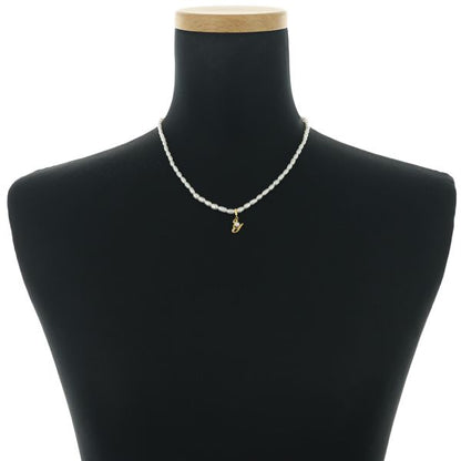 Mikimoto baby pearl necklace featuring 3.0-4.0mm freshwater pearls and a 3.7mm Akoya pearl initial Y pendant in 18k yellow gold