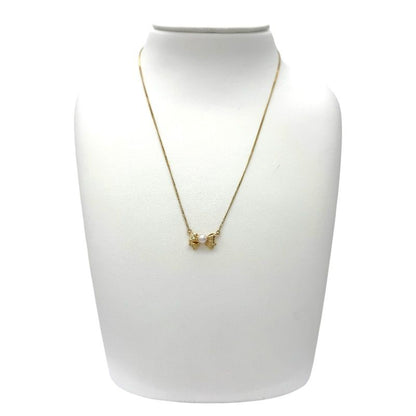 Tasaki Pearl Ribbon Necklace in 18K yellow gold with oval pearl and 39 cm chain