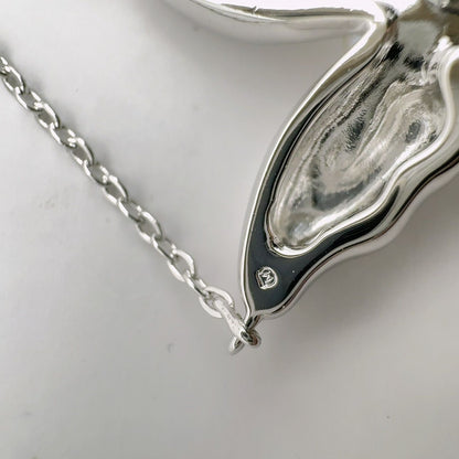 Mikimoto Butterfly necklace featuring sterling silver and 4mm pearl on a 43cm chain