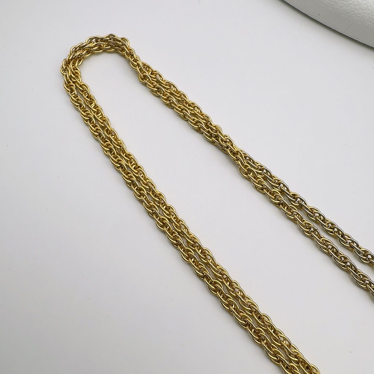 Mikimoto loupe necklace with 4mm pearl pendant and 64.5 cm chain displayed on white background
