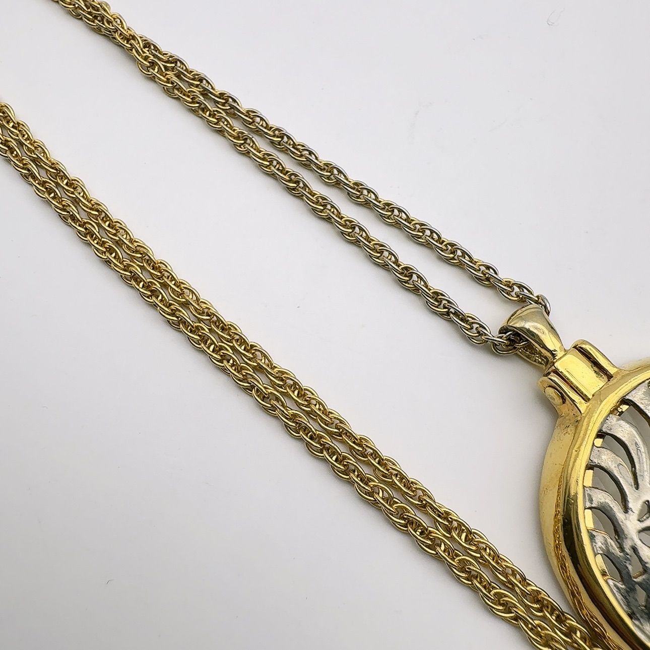 Mikimoto loupe necklace with 4mm pearl pendant and 64.5 cm chain displayed on white background