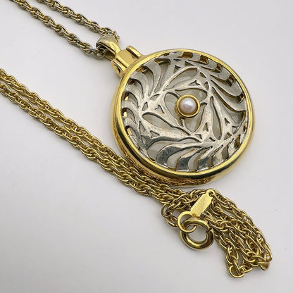 Mikimoto loupe necklace with 4mm pearl pendant and 64.5 cm chain displayed on white background