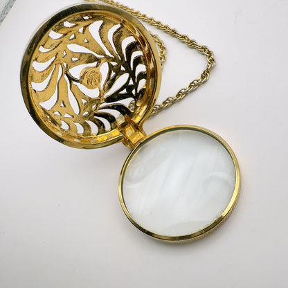 Mikimoto loupe necklace with 4mm pearl pendant and 64.5 cm chain displayed on white background
