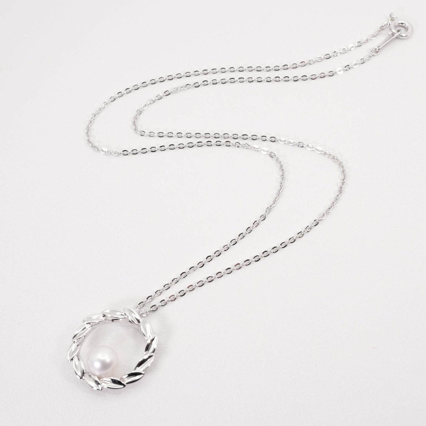 Mikimoto Silver Circle Necklace with Akoya pearls model 26-0646 in silver, clean and polished