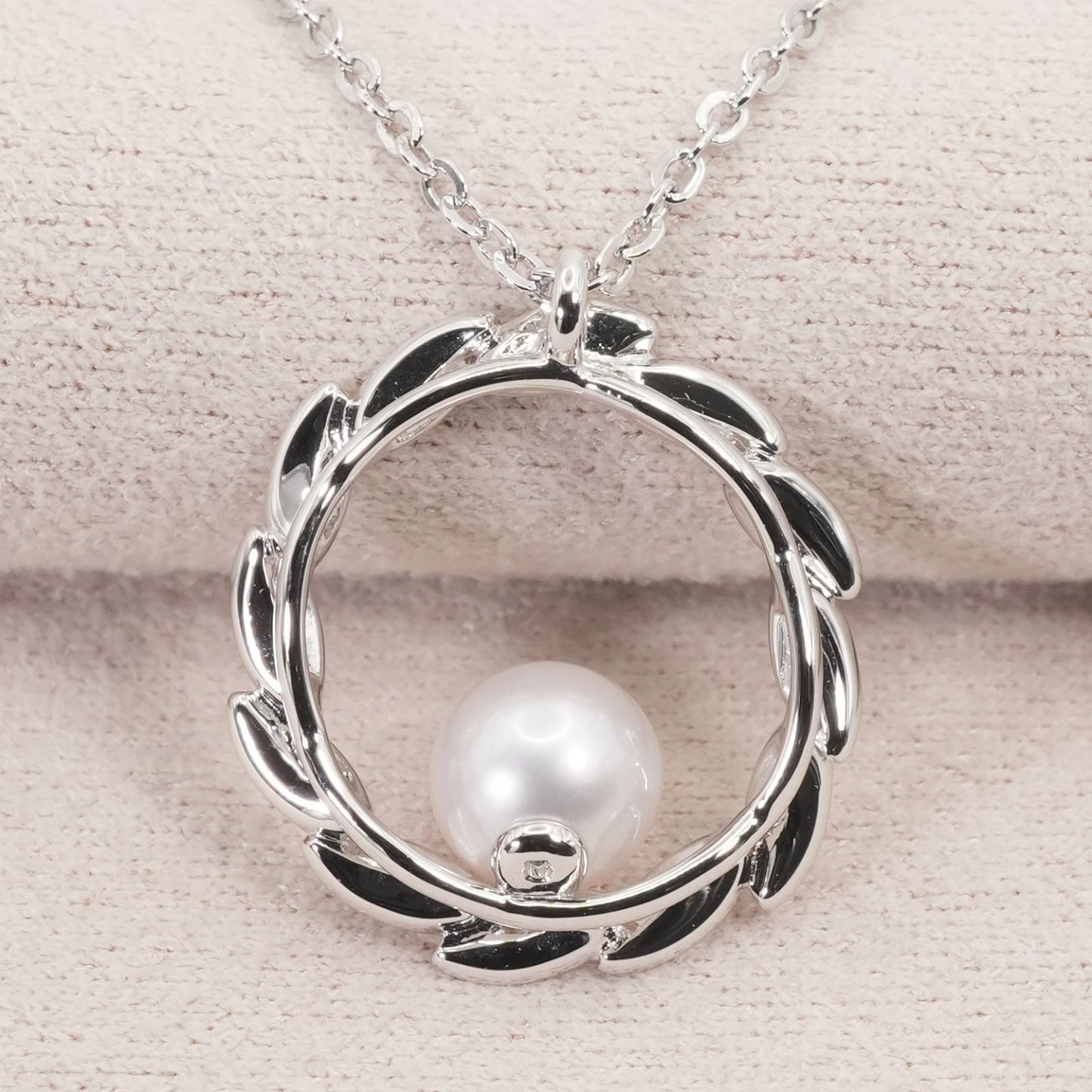 Mikimoto Silver Circle Necklace with Akoya pearls model 26-0646 in silver, clean and polished