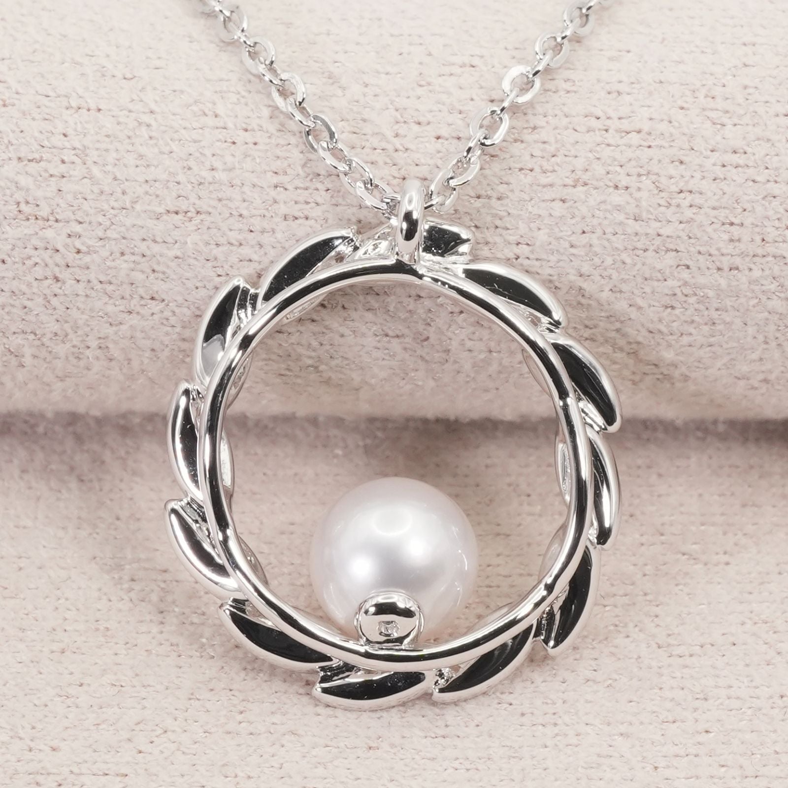 Mikimoto Silver Circle Necklace with Akoya pearls model 26-0646 in silver, clean and polished