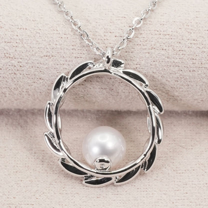 Mikimoto Silver Circle Necklace with Akoya pearls model 26-0646 in silver, clean and polished