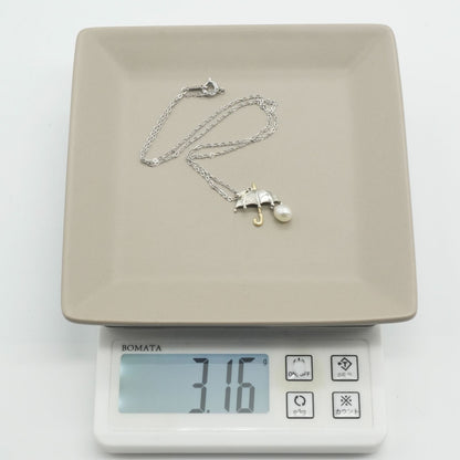 Mikimoto umbrella-shaped necklace in silver and K18 featuring a single pearl