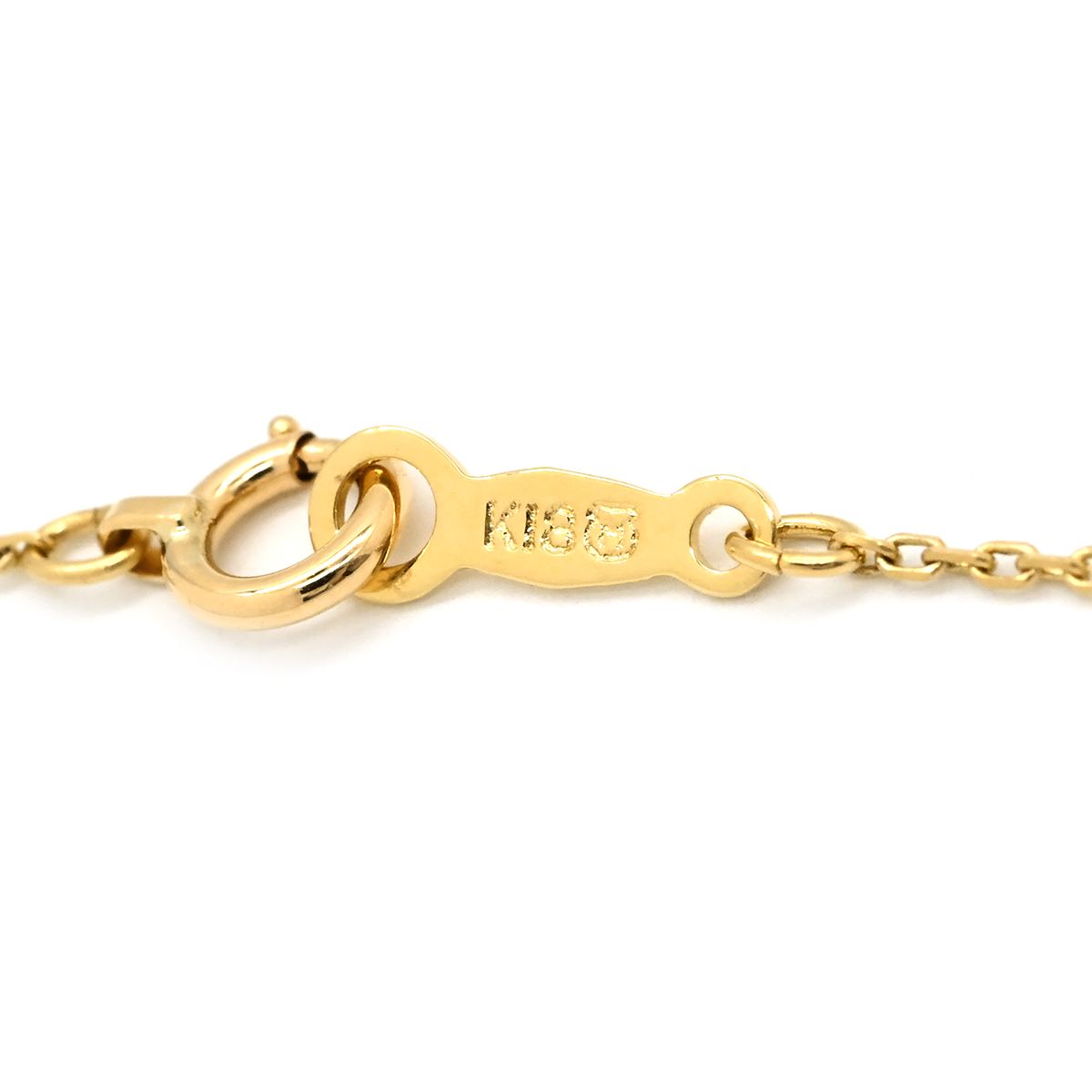Mikimoto pearl necklace with white pearls and yellow gold V-shape pendant, mid-size length