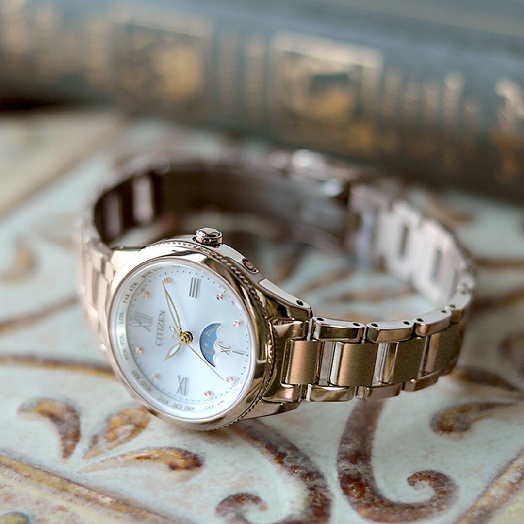 Citizen Xc Daichi Eco-Drive Titania Happy Flight ladies wristwatch with silky white dial and pink gold titanium band