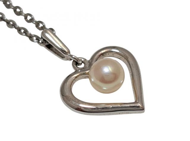 Mikimoto necklace featuring a 38mm baby pearl heart pendant on a 38cm silver chain