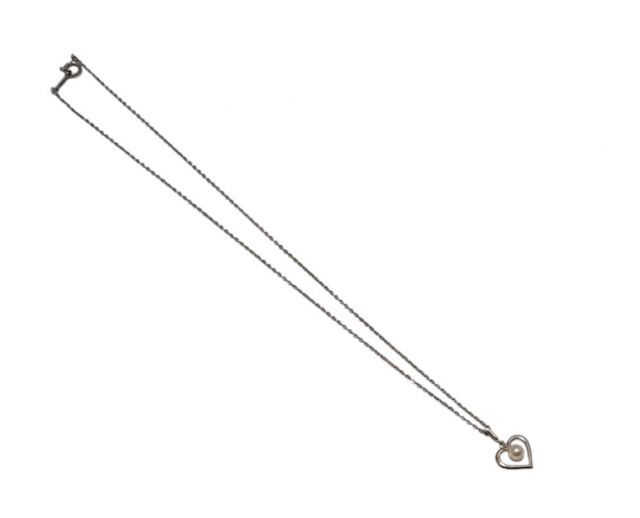 Mikimoto necklace featuring a 38mm baby pearl heart pendant on a 38cm silver chain