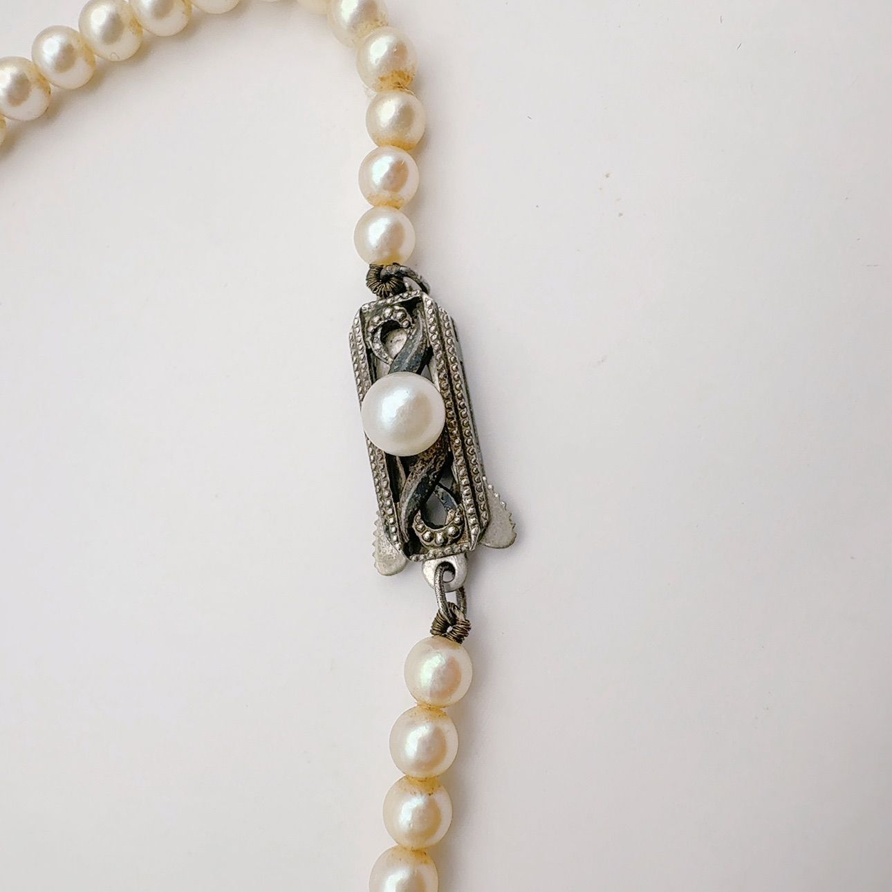 Mikimoto Necklace with 3.7-7 mm pearls and 45 cm chain displayed on a white background
