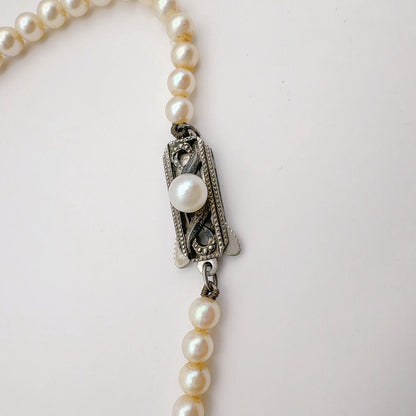 Mikimoto Necklace with 3.7-7 mm pearls and 45 cm chain displayed on a white background