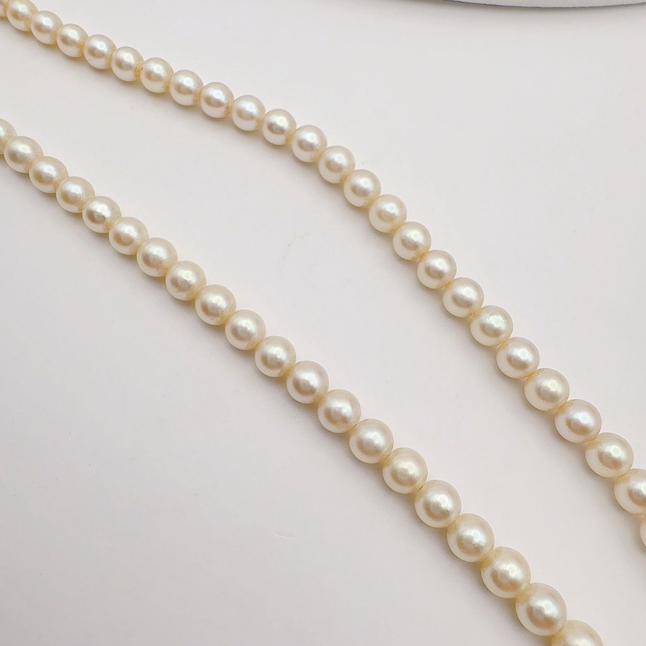 Mikimoto Necklace with 3.7-7 mm pearls and 45 cm chain displayed on a white background