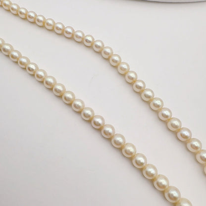 Mikimoto Necklace with 3.7-7 mm pearls and 45 cm chain displayed on a white background