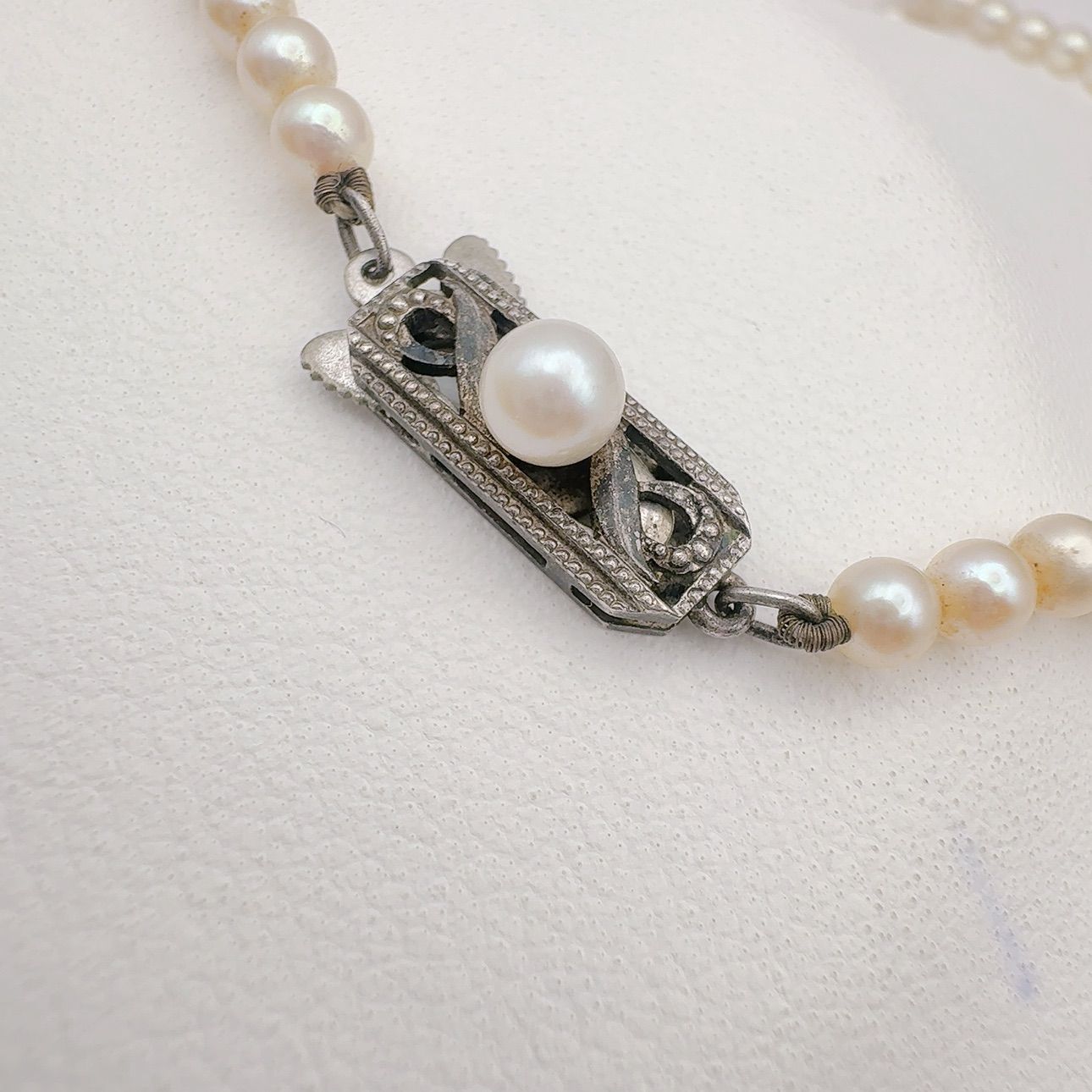 Mikimoto Necklace with 3.7-7 mm pearls and 45 cm chain displayed on a white background
