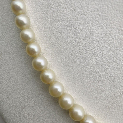 Mikimoto Necklace with 3.7-7 mm pearls and 45 cm chain displayed on a white background