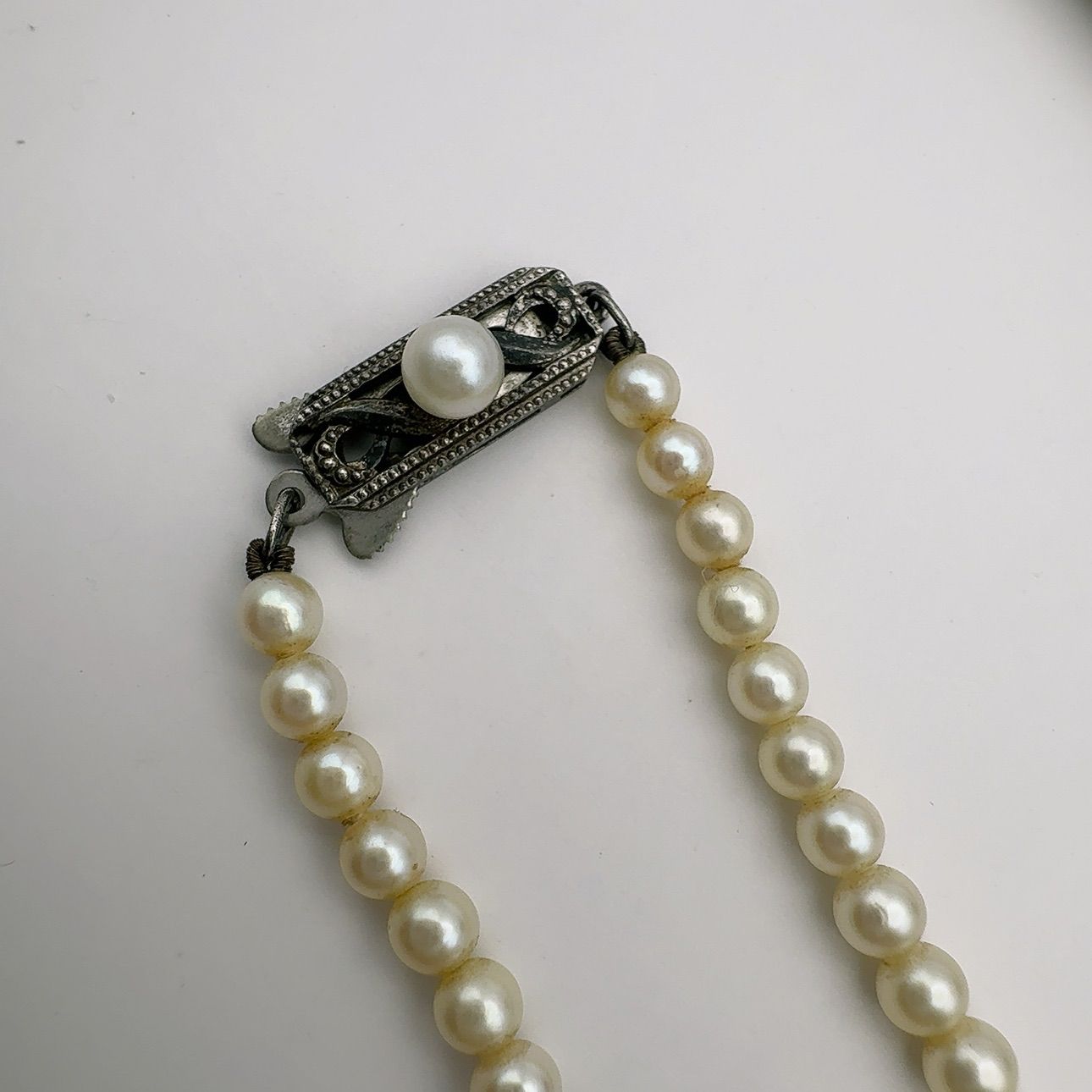 Mikimoto Necklace with 3.7-7 mm pearls and 45 cm chain displayed on a white background