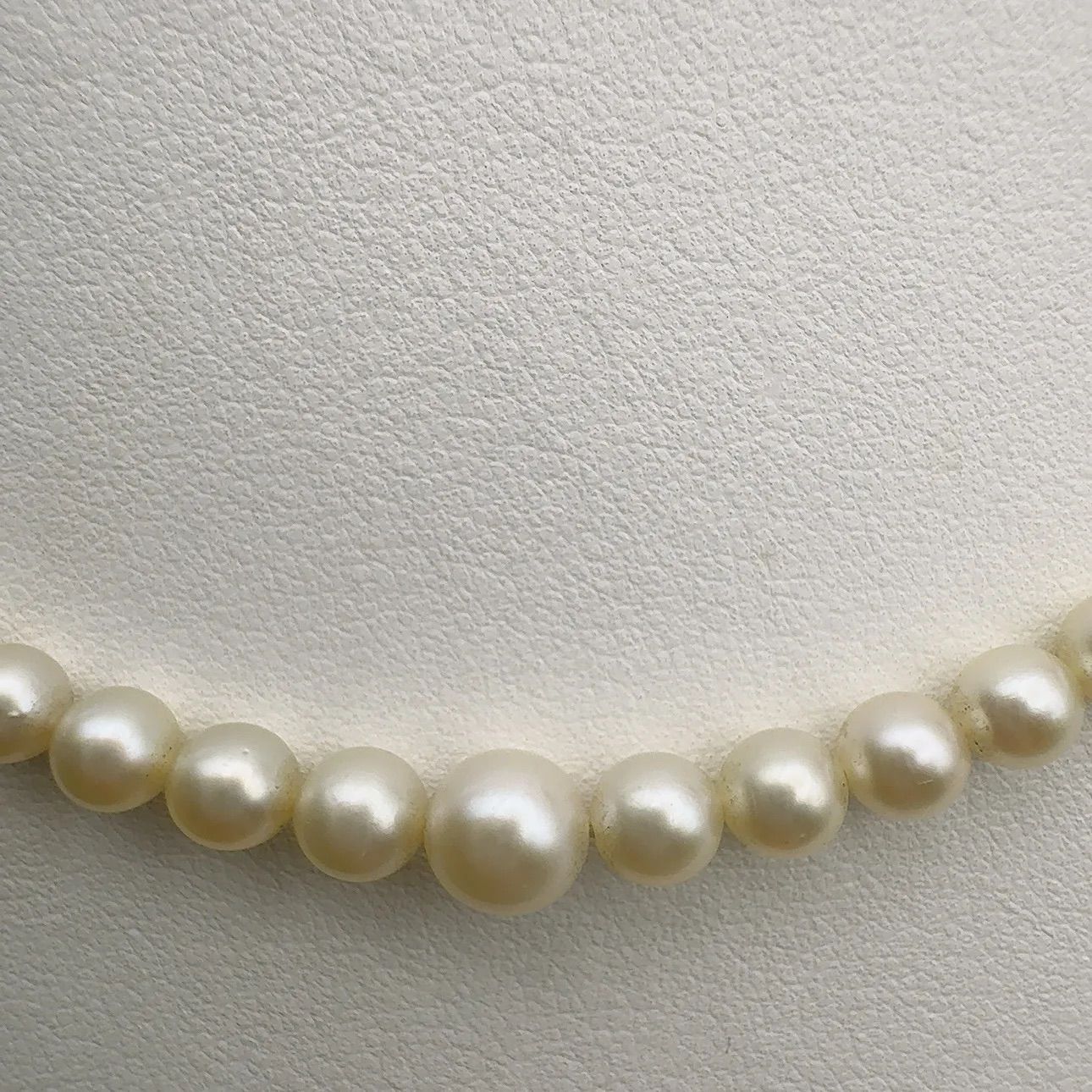 Mikimoto Necklace with 3.7-7 mm pearls and 45 cm chain displayed on a white background