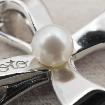 Mikimoto silver necklace with a baby pearl cross pendant, showcasing delicate craftsmanship and polished finish