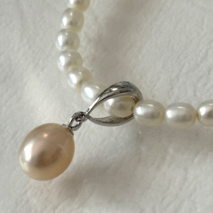 389 Mikimoto Perlite necklace with silver chain and white pearl pendant, 42 cm length