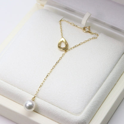 Mikimoto K18 Y-shaped drop pearl necklace featuring lustrous pearls with included box