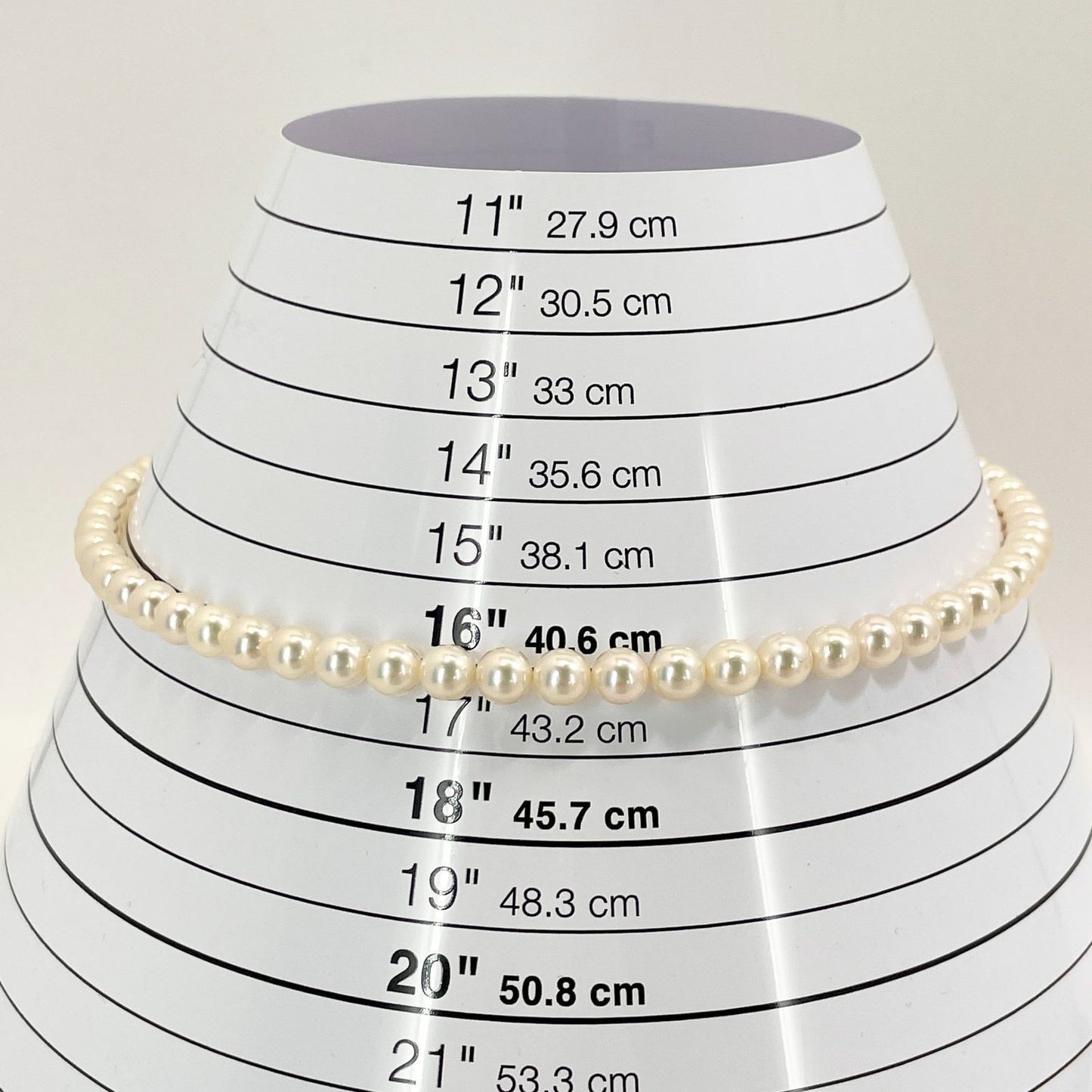 Mikimoto Akoya Pearl Silver Necklace model 24-2988 displayed with pearls and silver chain in jewelry box
