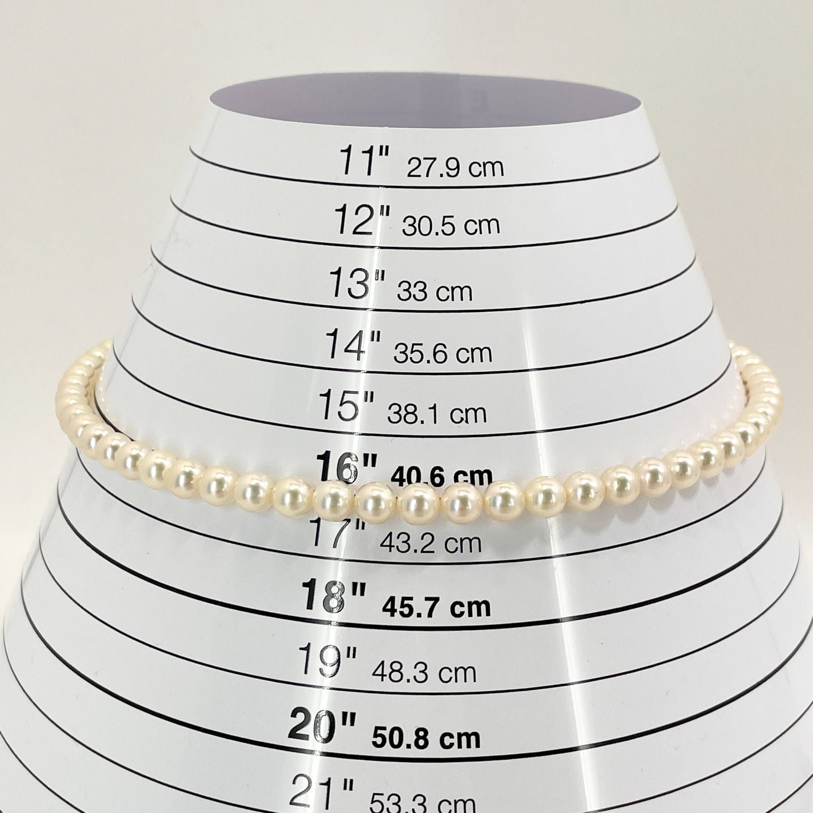 Mikimoto Akoya Pearl Silver Necklace model 24-2988 displayed with pearls and silver chain in jewelry box