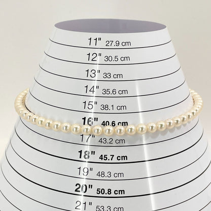 Mikimoto Akoya Pearl Silver Necklace model 24-2988 displayed with pearls and silver chain in jewelry box
