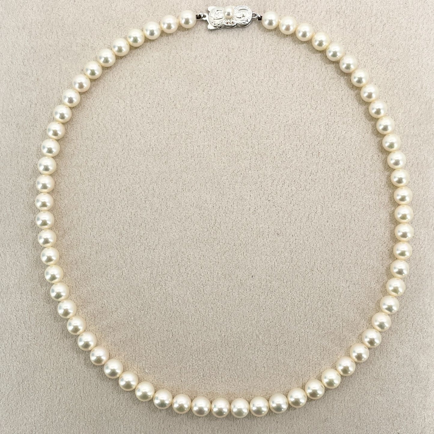Mikimoto Akoya Pearl Silver Necklace model 24-2988 displayed with pearls and silver chain in jewelry box