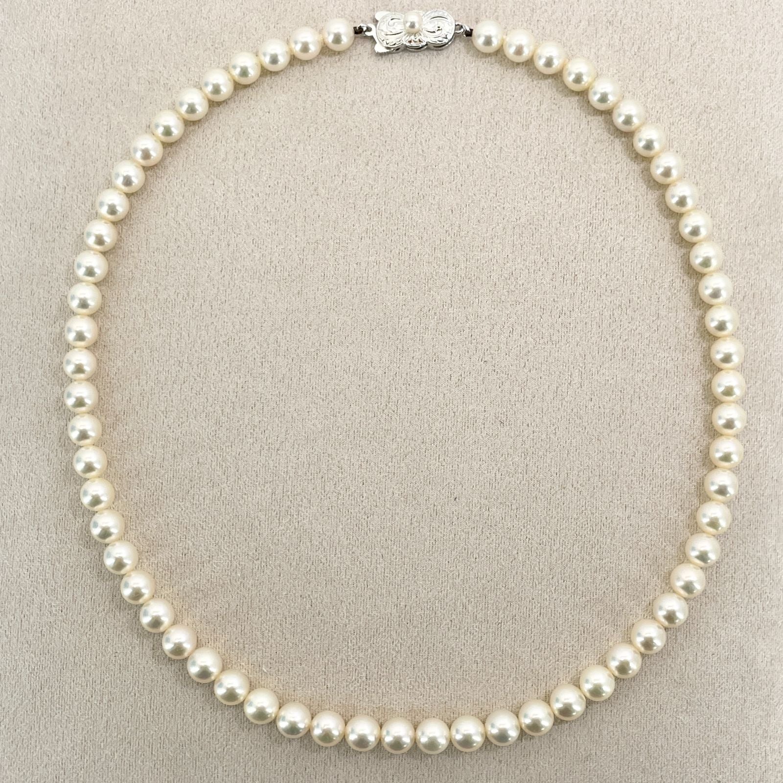 Mikimoto Akoya Pearl Silver Necklace model 24-2988 displayed with pearls and silver chain in jewelry box
