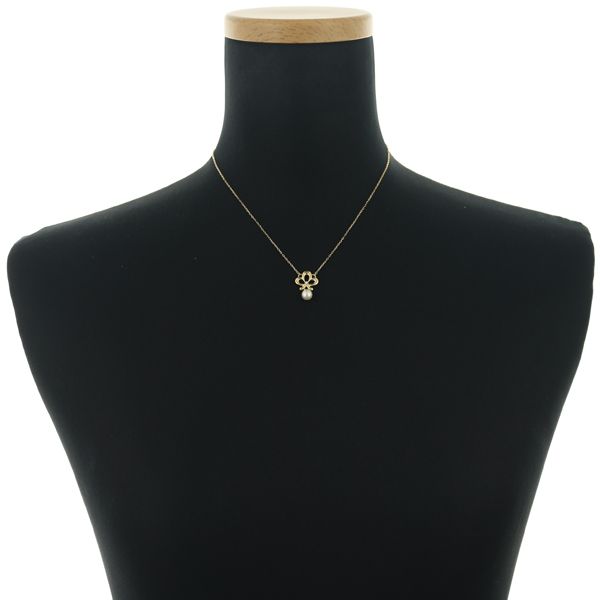 Mikimoto necklace with 5.7mm pearl and diamond set in 18 karat yellow gold with 39 cm chain
